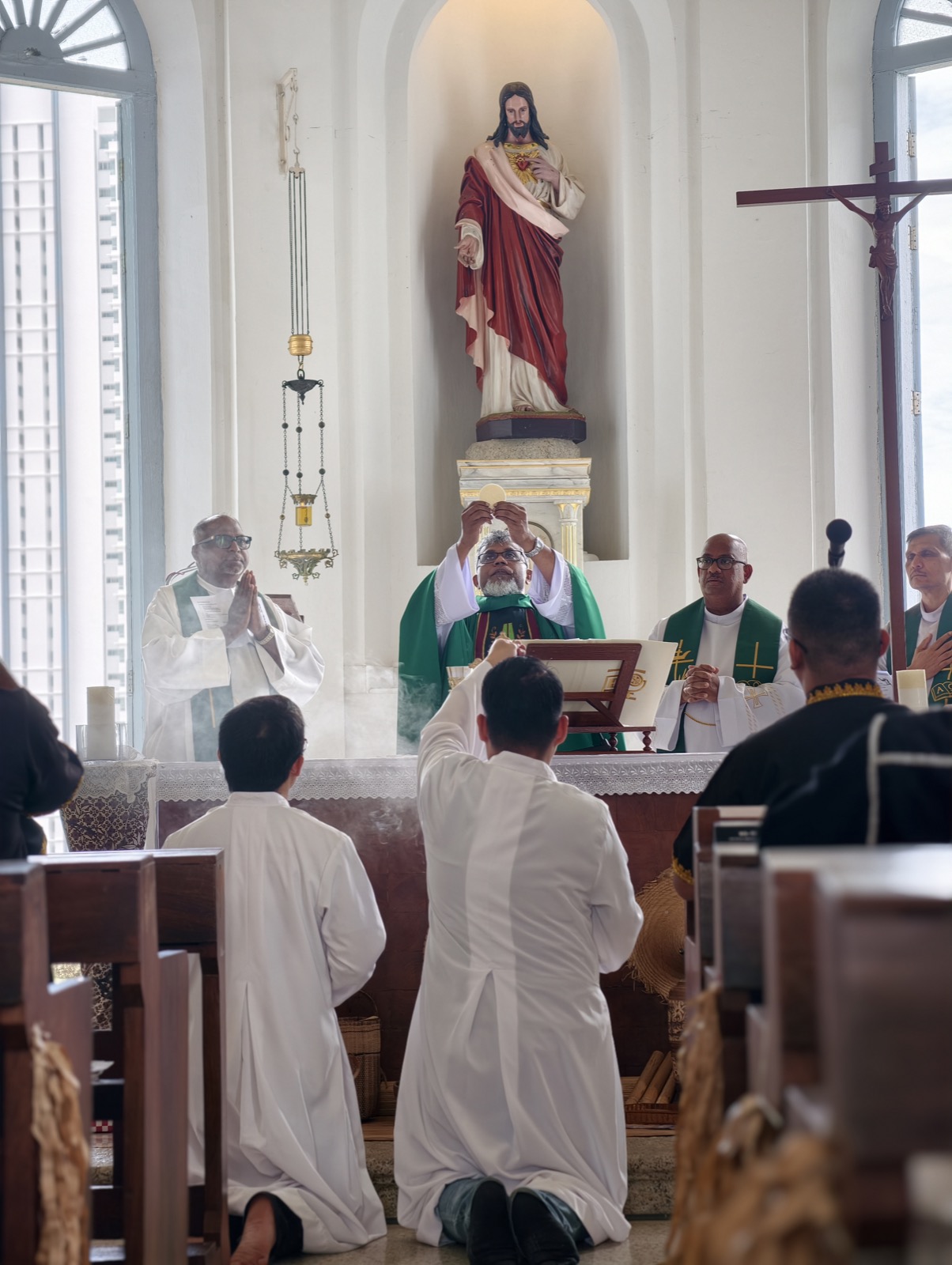 Mass in the chapel beside the statue of Christ