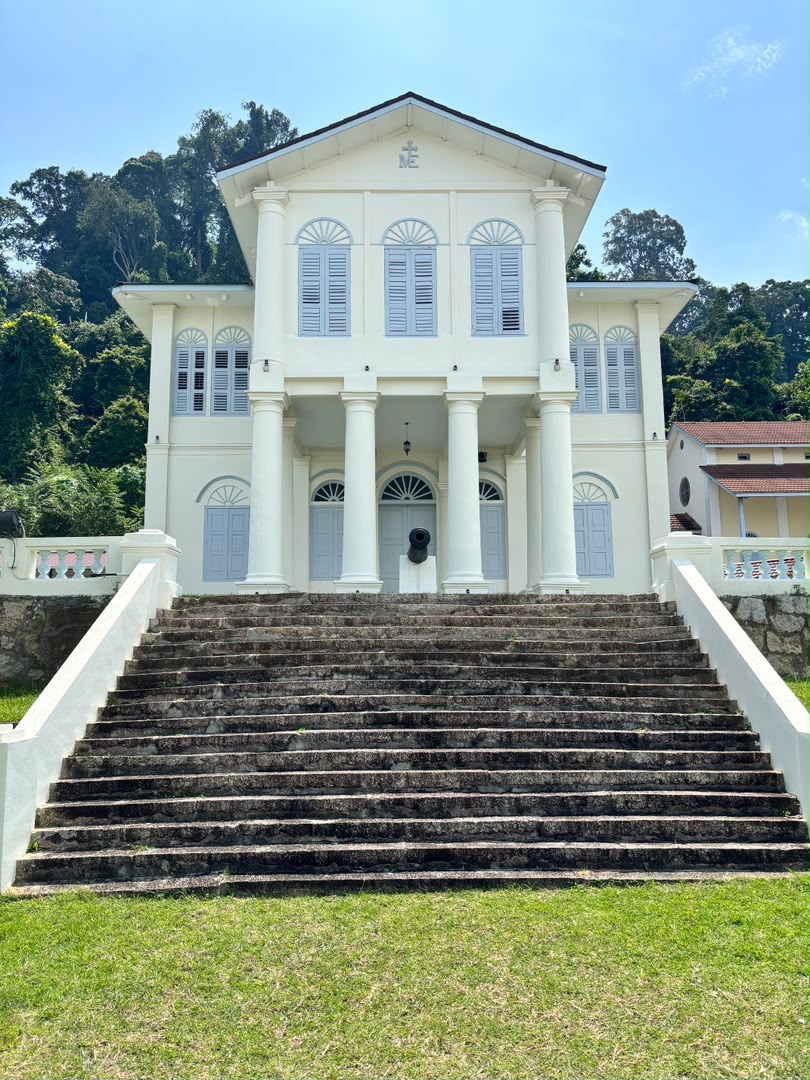 The cover photograph of the 2026 edition: the seminary's colonial house, seen from the foot of its stone staircase